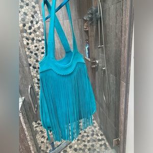 Turquoise fringe shoulder bag. Used once. Bought from boutique, no brand name